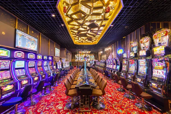 A close-up shot of golden coins falling around a spinning roulette wheel, representing immersive casino action at BDT88.